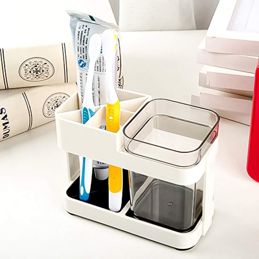 CUP TOOTHPASTE HOLDER